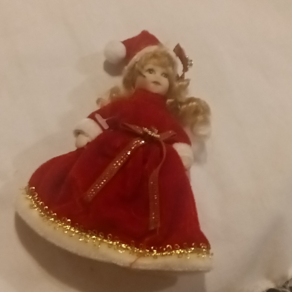4 in porcelain Christmas doll